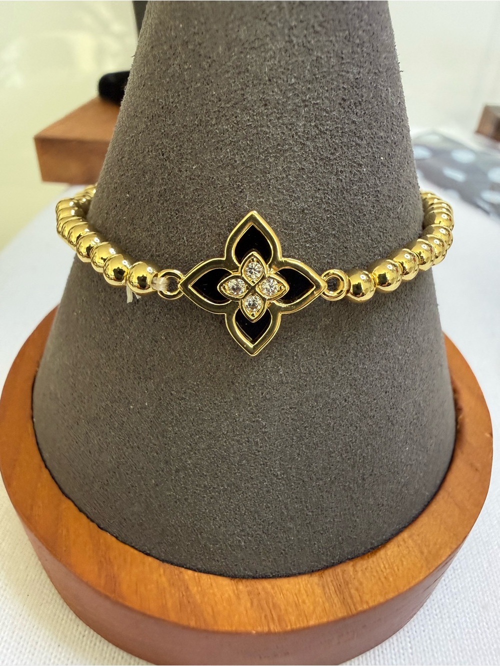 Stunning Gold beaded black enamel flower bracelet